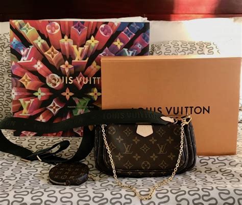 louis vuitton multi pochette how to tell a fake|false louis vuitton prints.